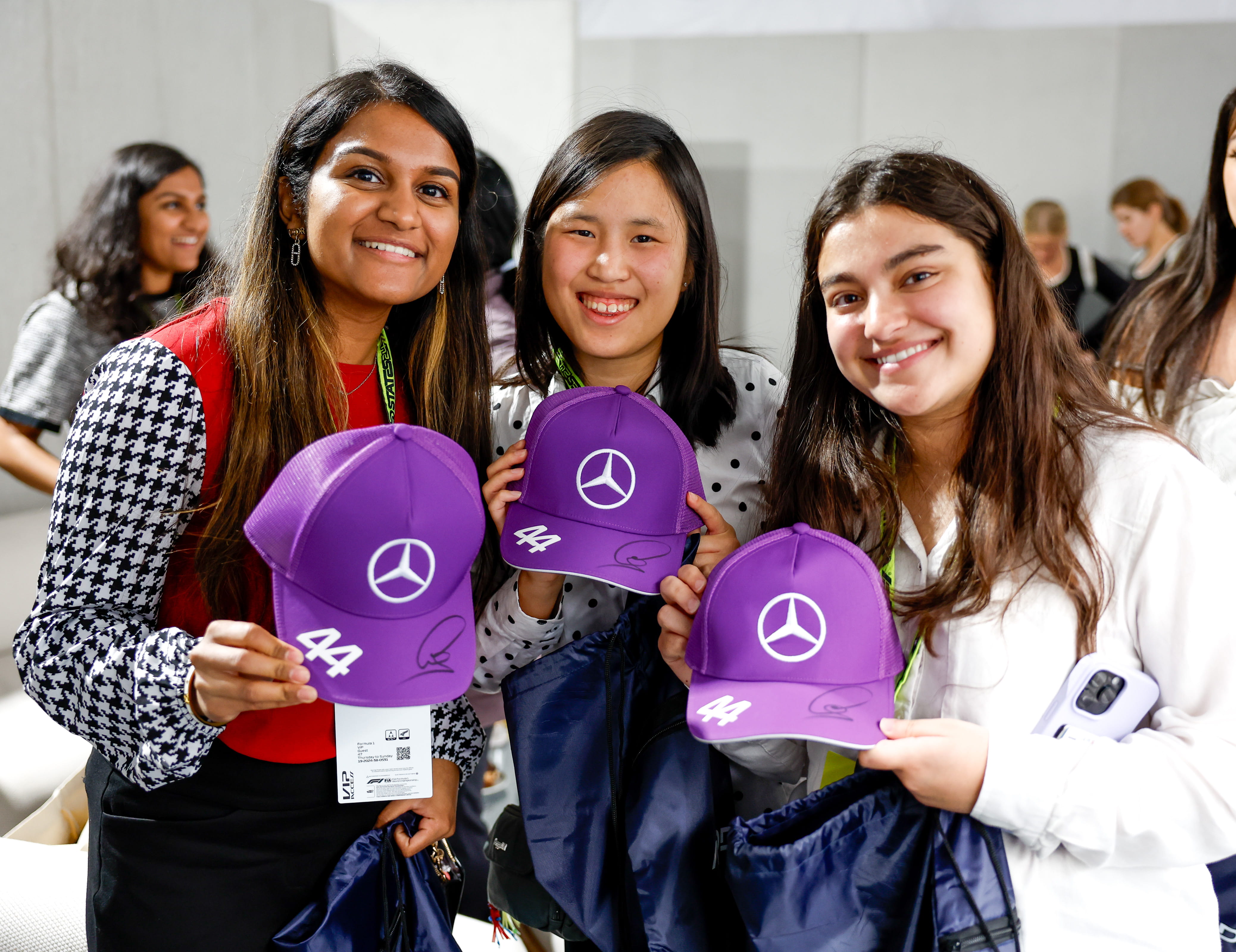 girls with signed caps