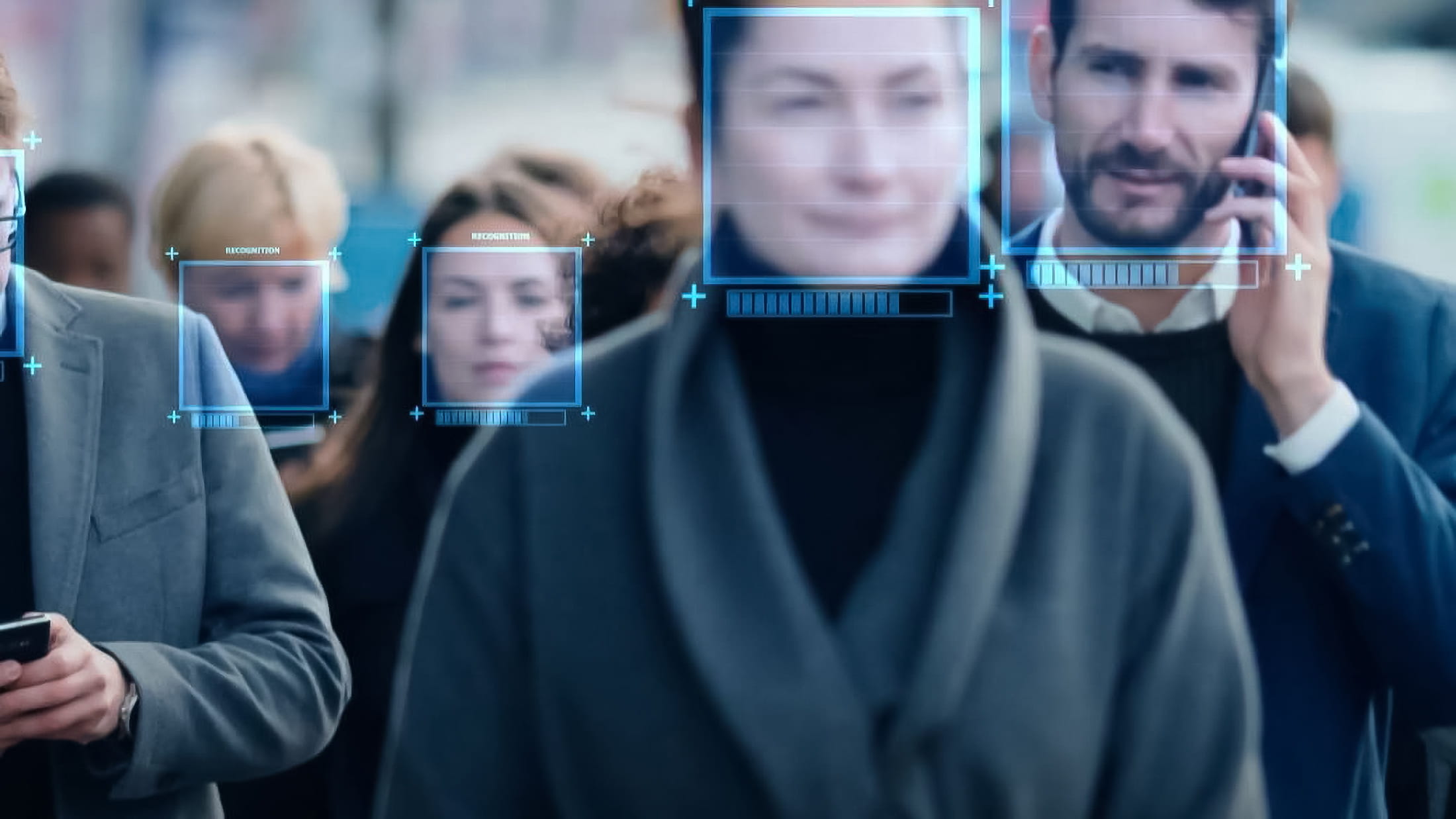 People on a street with their faces framed as if screened